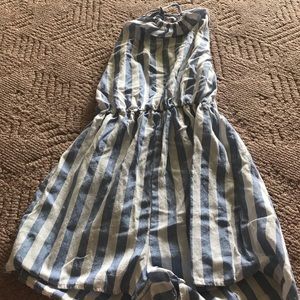 A blue and white striped romper